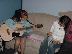 young child waiting for Guitar Lessons in redondo